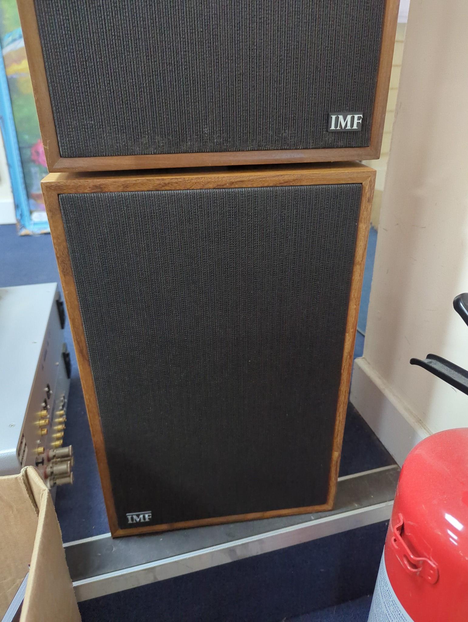 A Bladelius pre main amplifier, model TYR, and CD player, model SYN, a Pro-Ject Xpression III turntable, pair of IMF speakers and a Trichord Dino power supply.